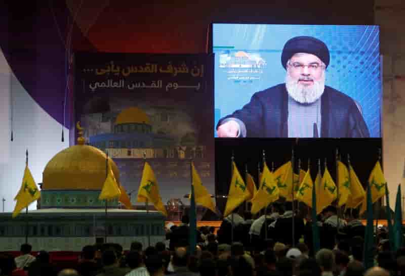 Un conflit avec israel attirerait des milliers de combattants, dit le hezbollah