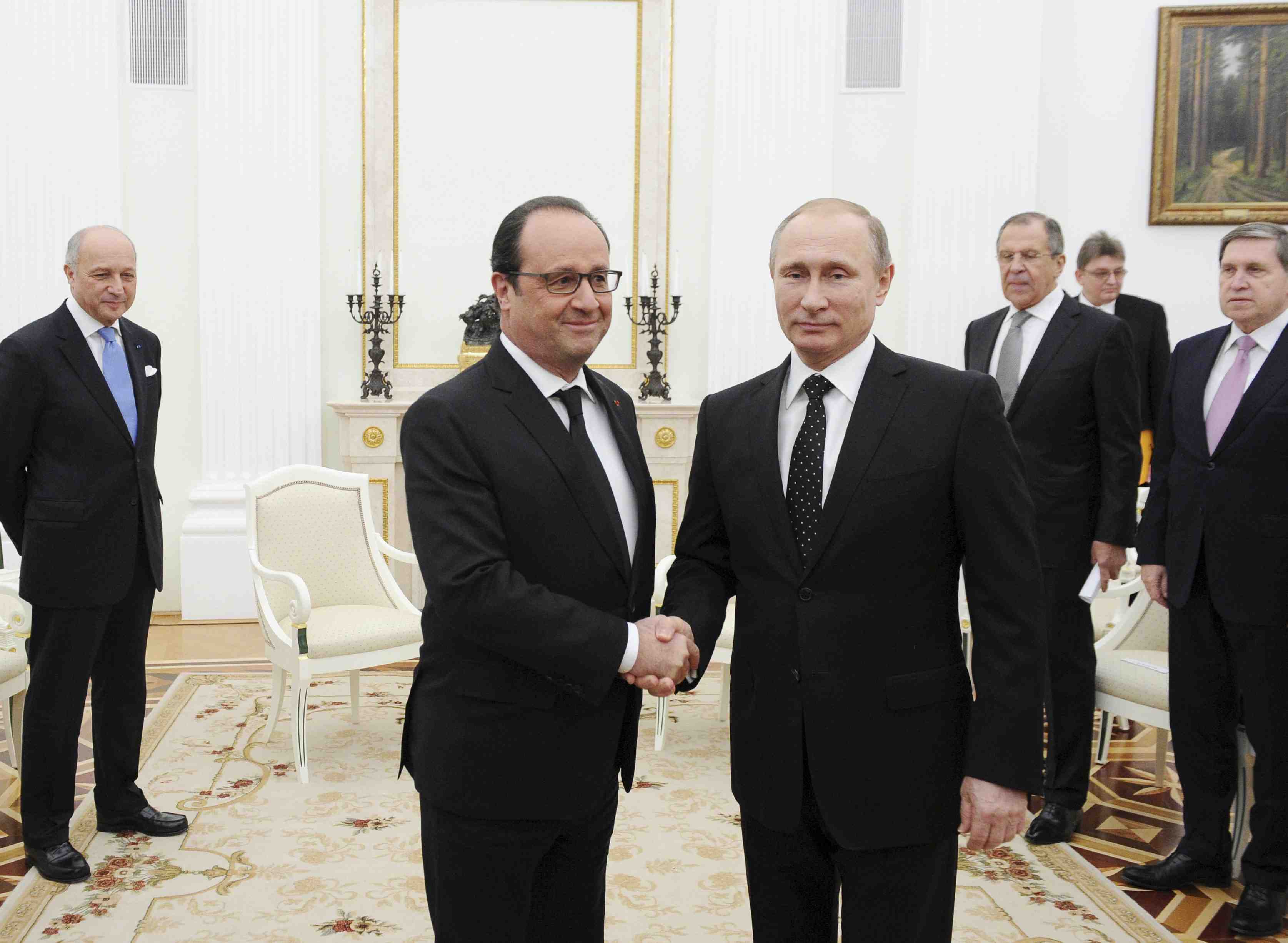 Francois hollande et vladimir poutine prets a cooperer contre l'ei en syrie