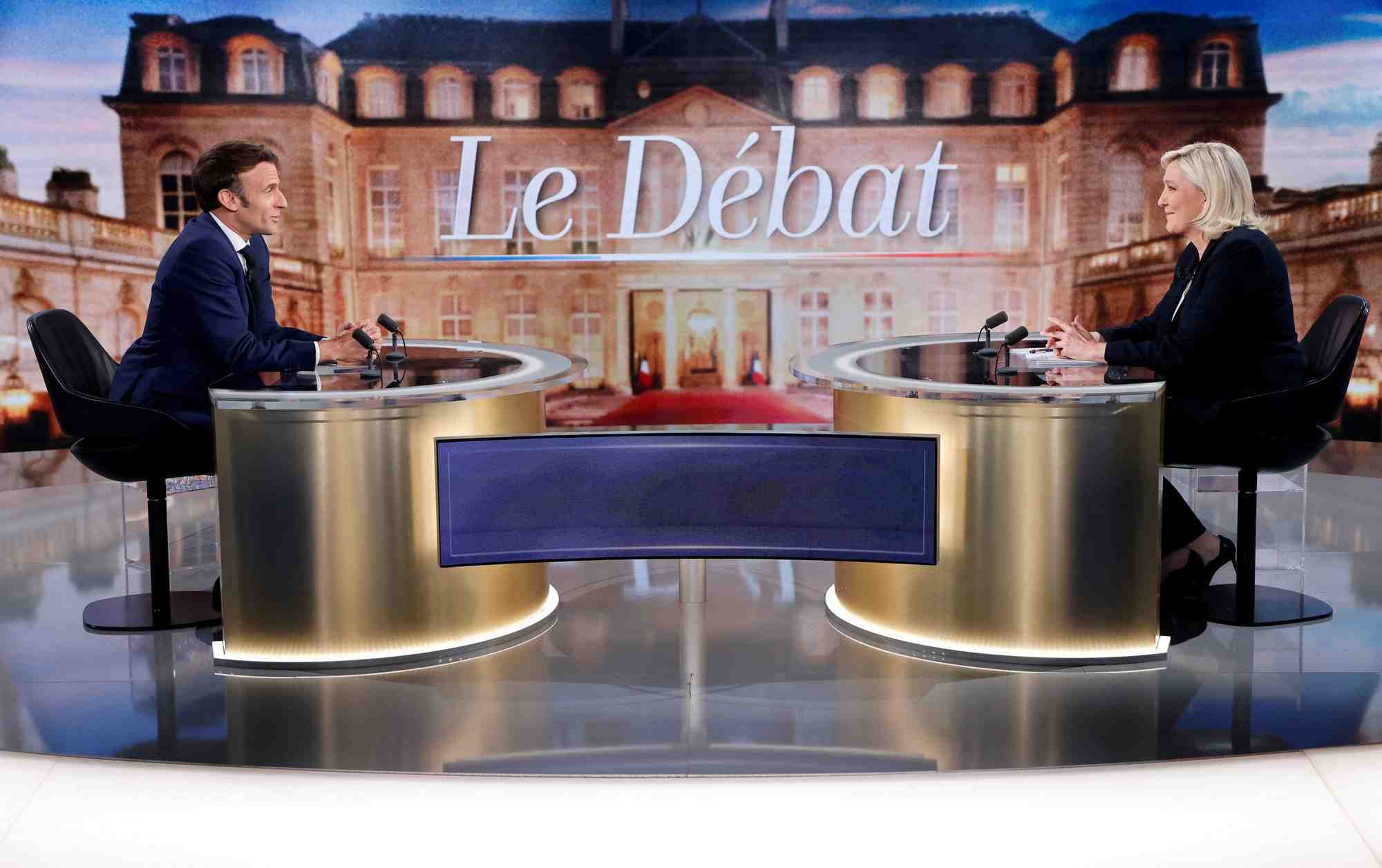 France 2022: apres le debat, le pen et macron de retour sur le terrain
