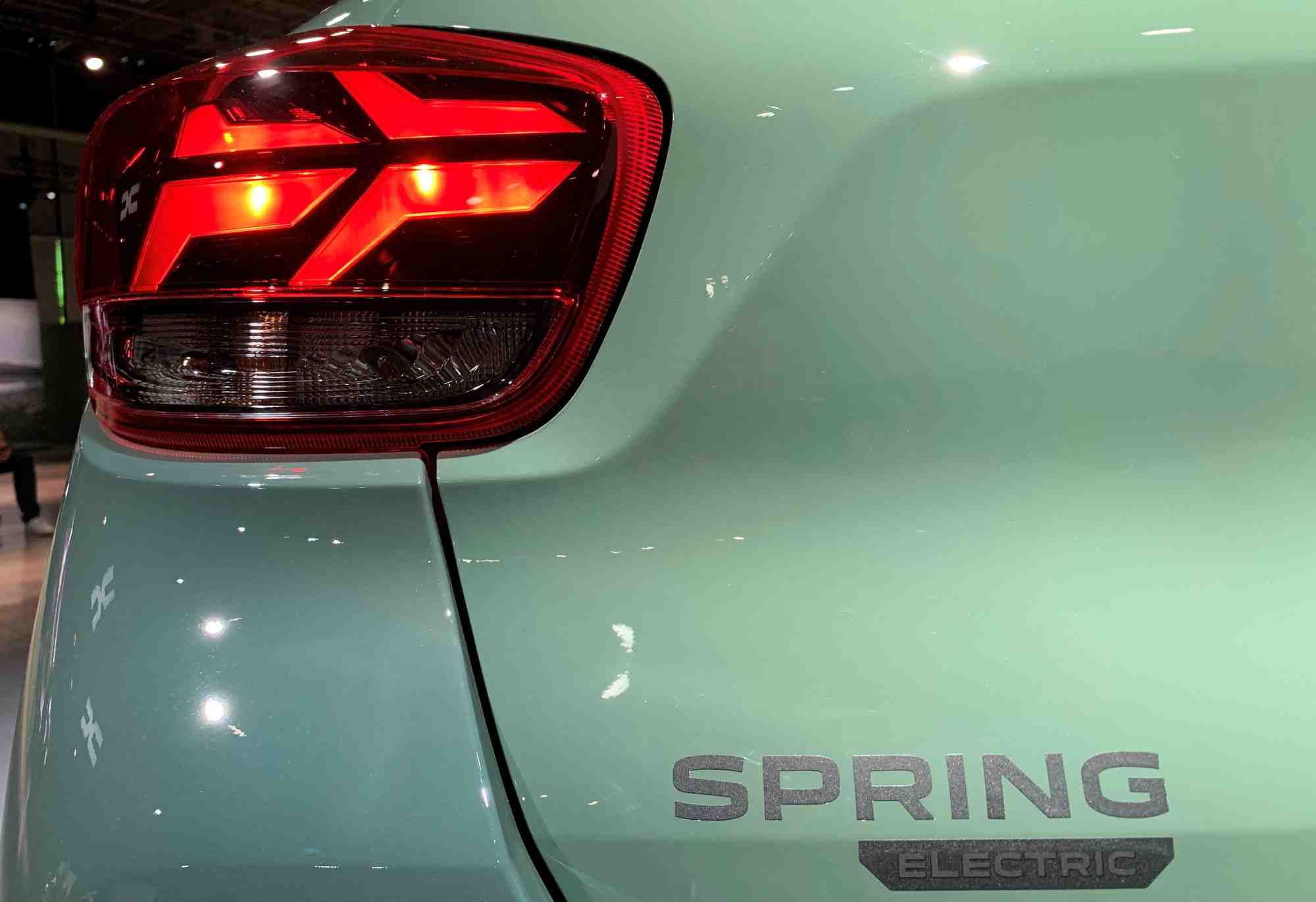 Le feu arriere d'une voiture electrique dacia spring, au bourget pres de paris