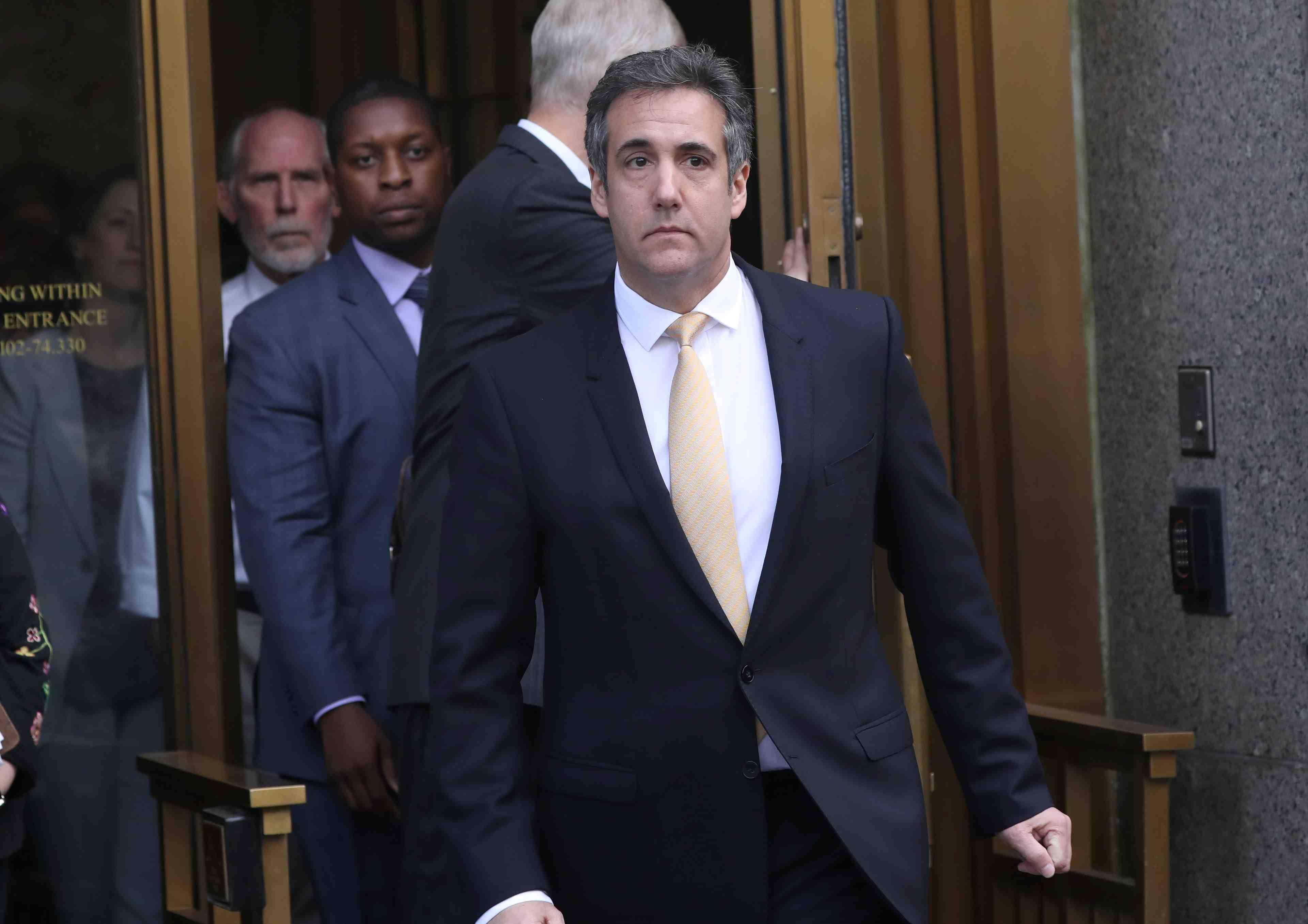 Affaire cohen/trump: immunite judiciaire pour deux dirigeants du tabloid national enquirer