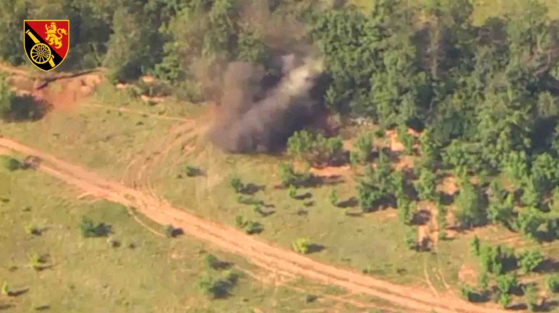 Une vue montre la fumee s'elevant lorsque les forces ukrainiennes detruisent l'equipement russe pres de bakhmut