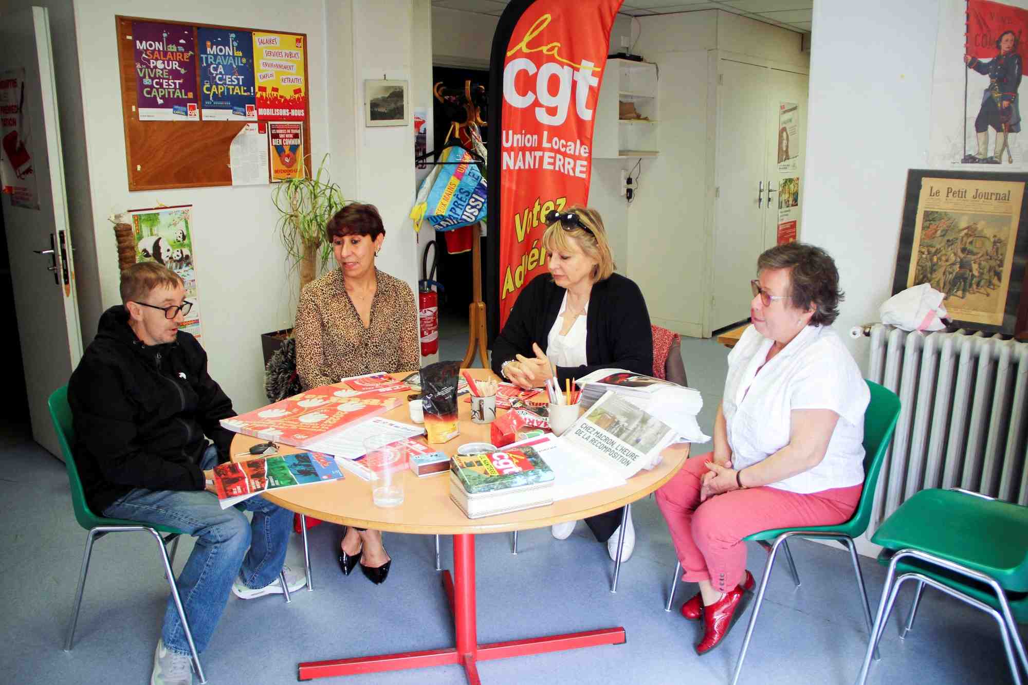 French cgt labour union members prepare the labour day protest at their local office in nanterre