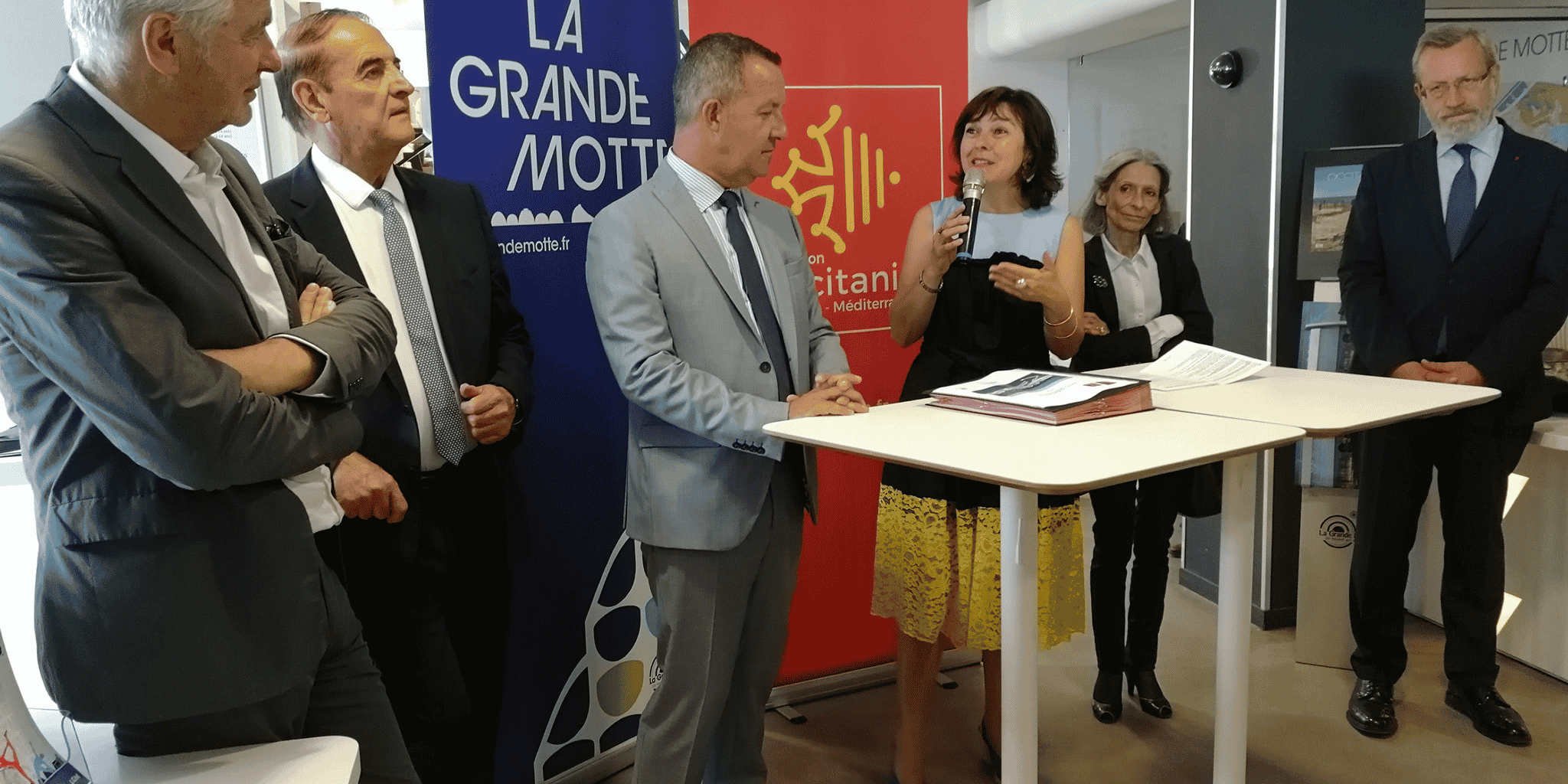 F. Leclercq (architecte), K. Mesquida (CD34), S. Rossignol (Ville), C. Delga (Région), C. Segura-Balladur (fille de Jean Balladur), et P. Pouëssel (préfet)