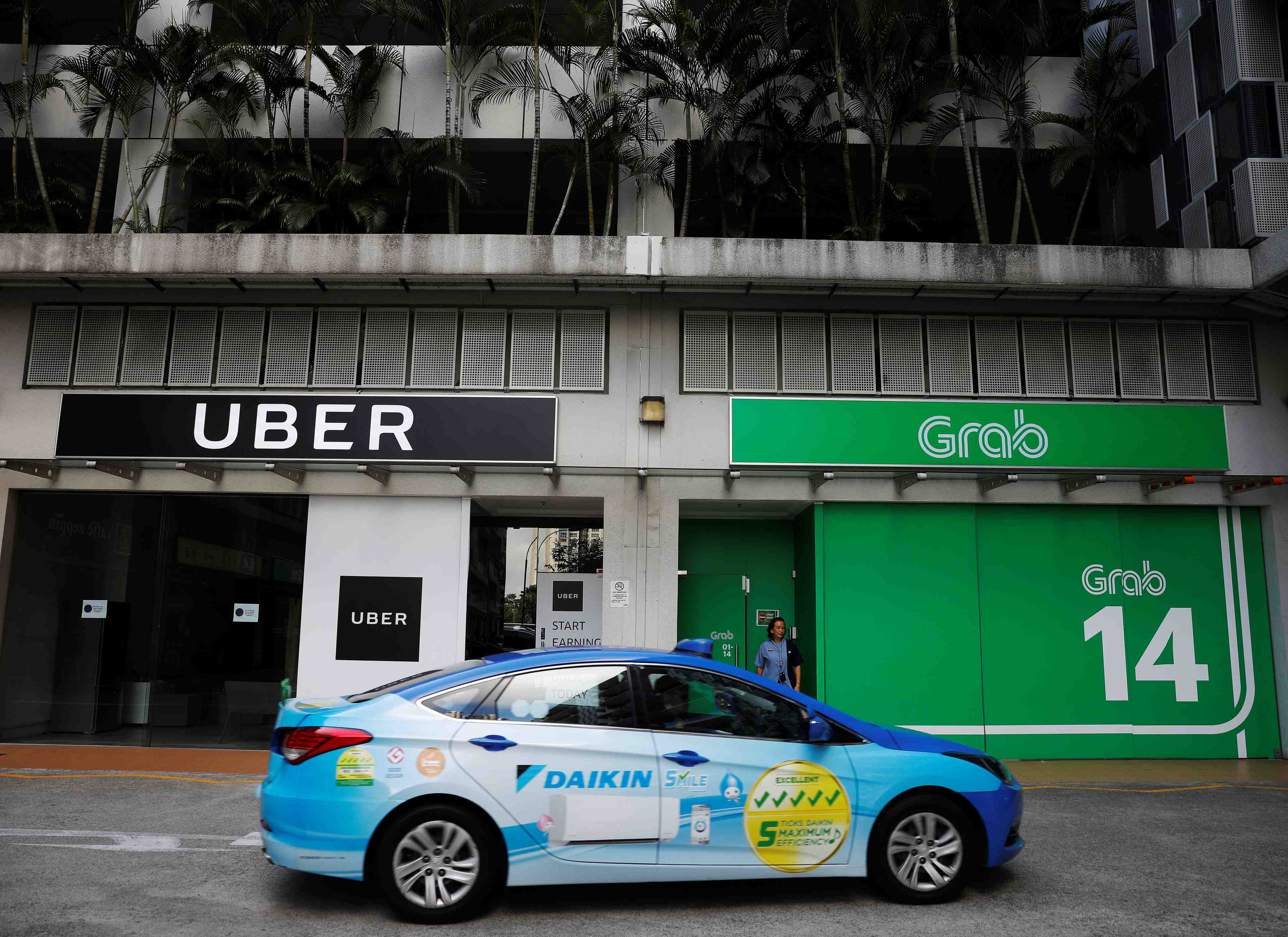 Singapour enquete sur l'accord entre uber et grab