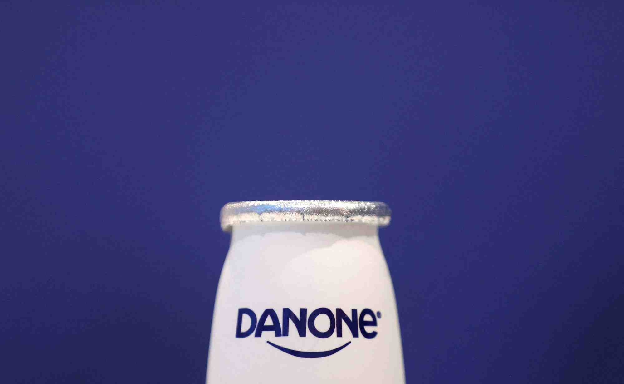 Danone revise en hausse sa prevision de chiffre d'affaires annuel apres un deuxieme trimestre meilleur que prevu