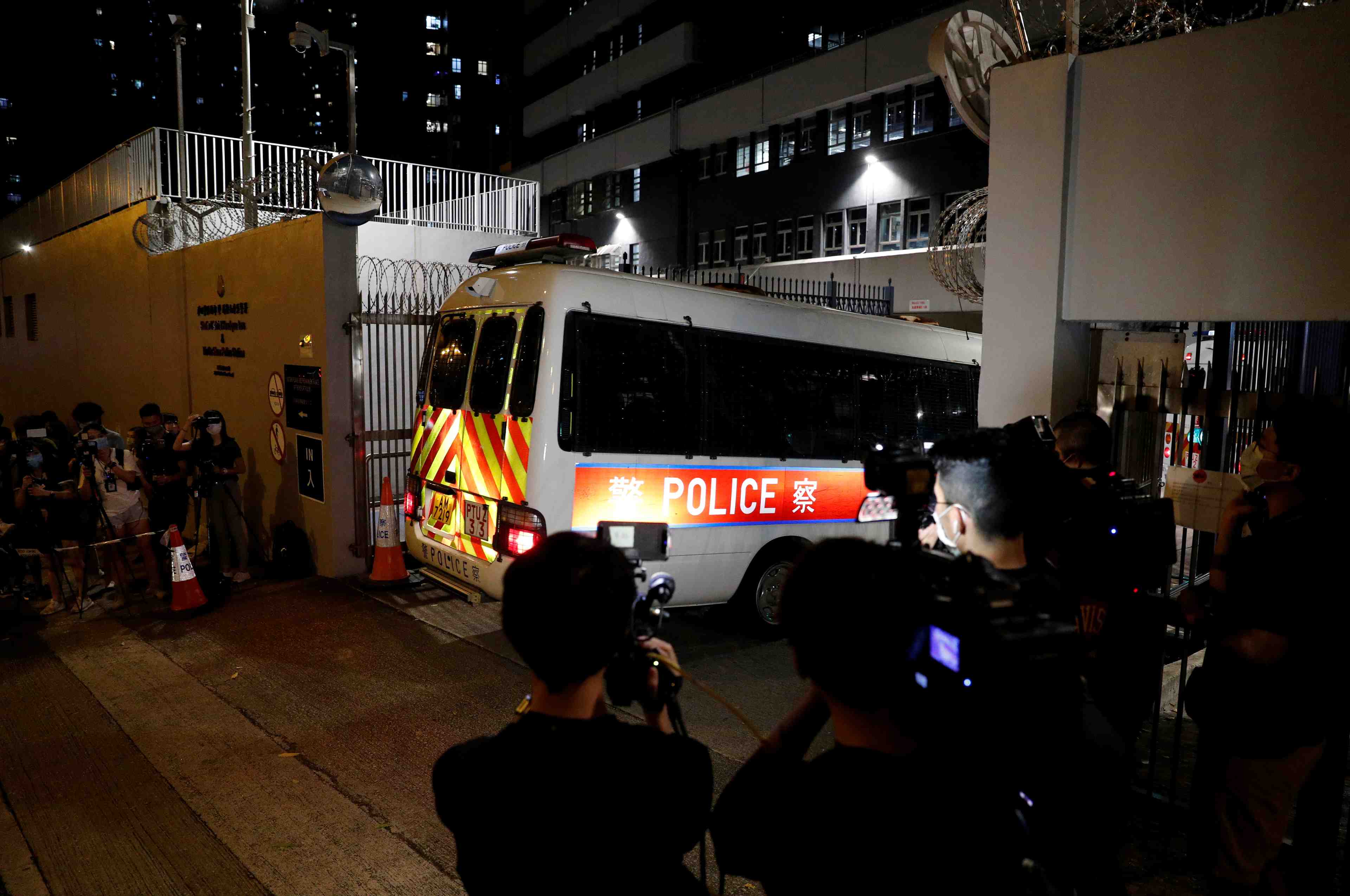 Hong kong: la police arrete quatre personnes dans le cadre de la loi securitaire