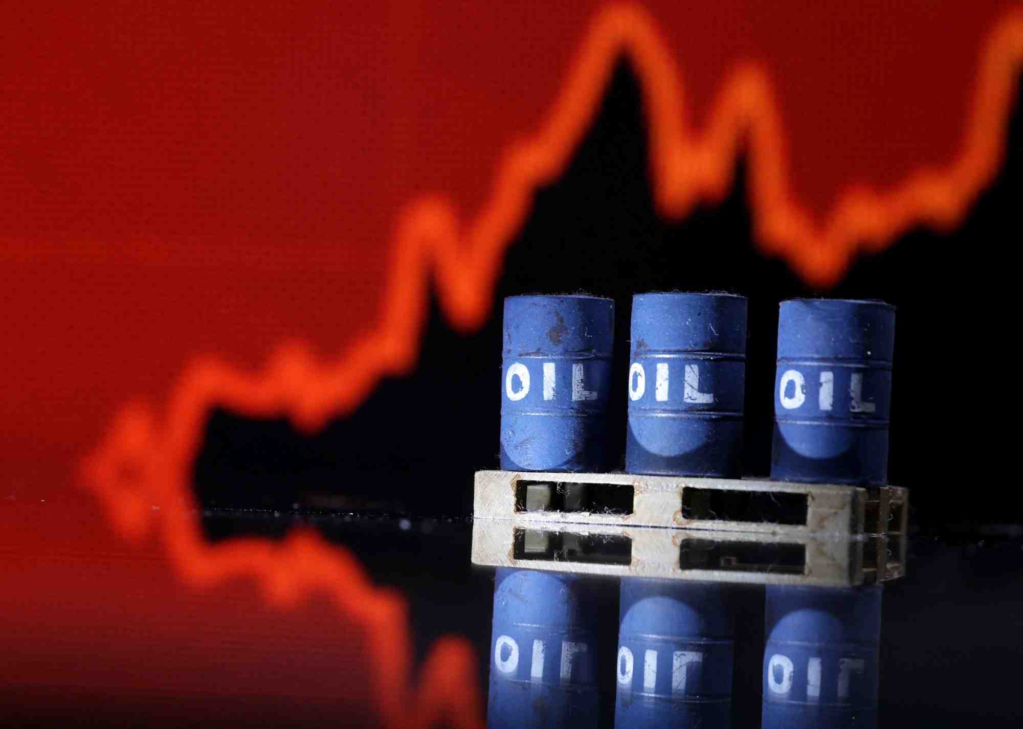 Illustration montrant des barils de petrole devant un graphique boursier