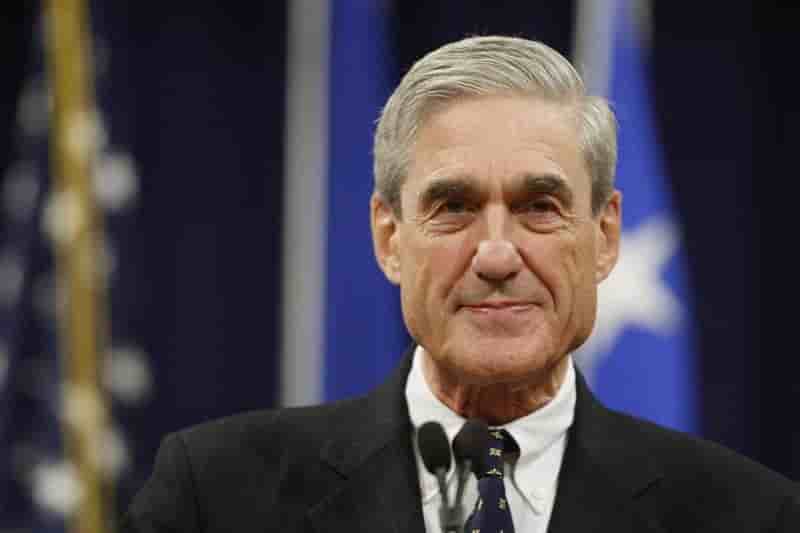 Mueller pauses during his remarks at a farewell ceremony held for him at the justice department in washington