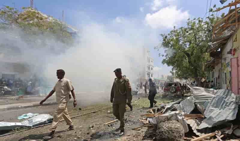 Security officers arrive to secure the scene of an explosion near wehliye hotel on maka al mukaram street in somalia's capital mogadishu