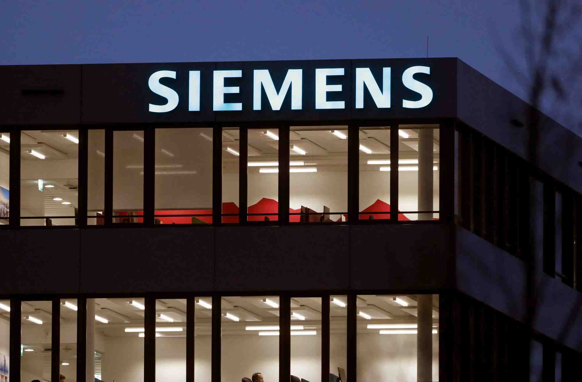 File photo: the logo of german industrial group siemens is seen in zug