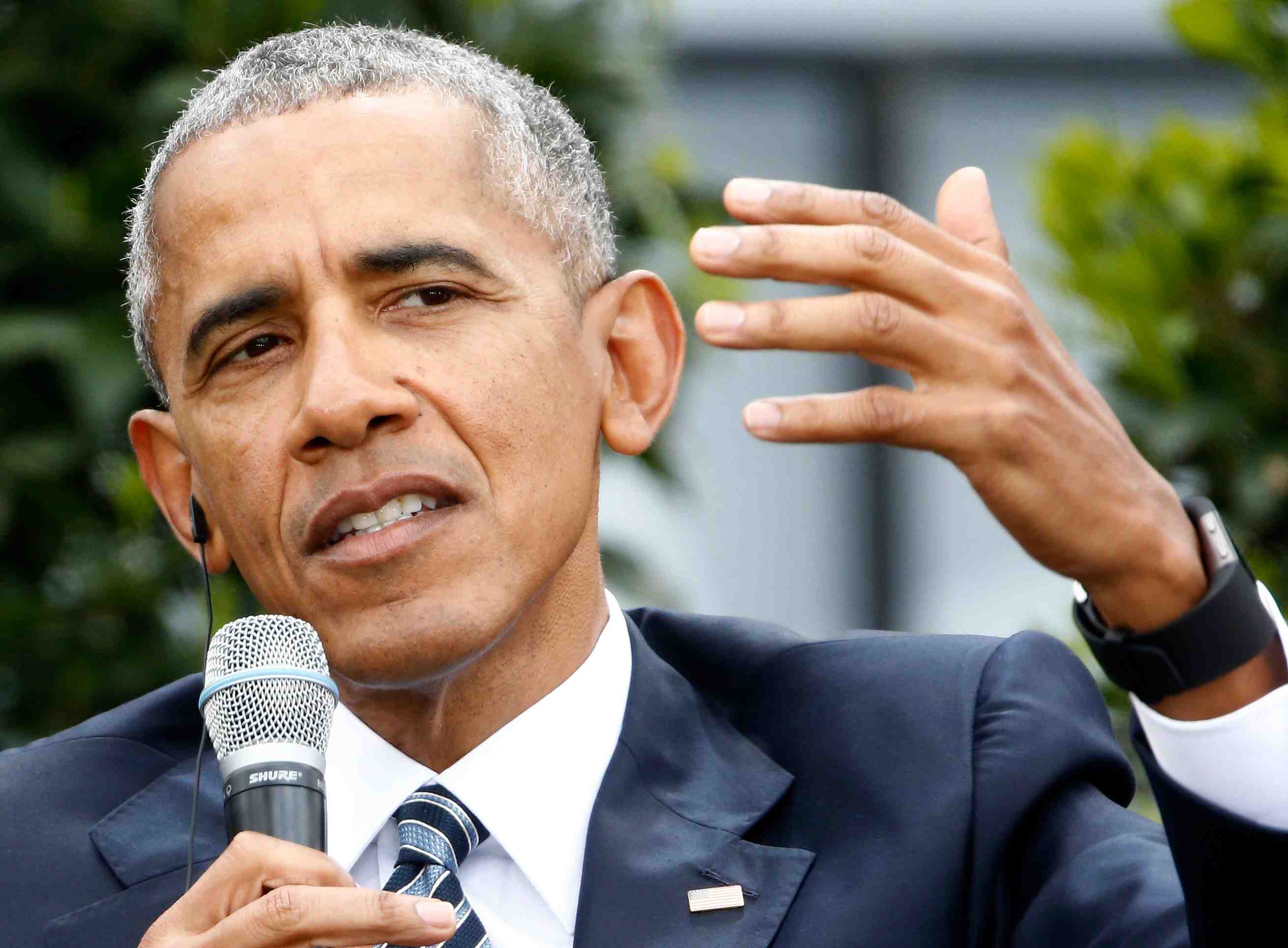 Obama denonce ceux qui se cachent "derriere des murs"