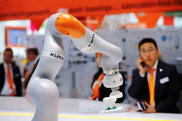 A robot arm of german industrial robot maker kuka is pictured at the company's stand in hanover