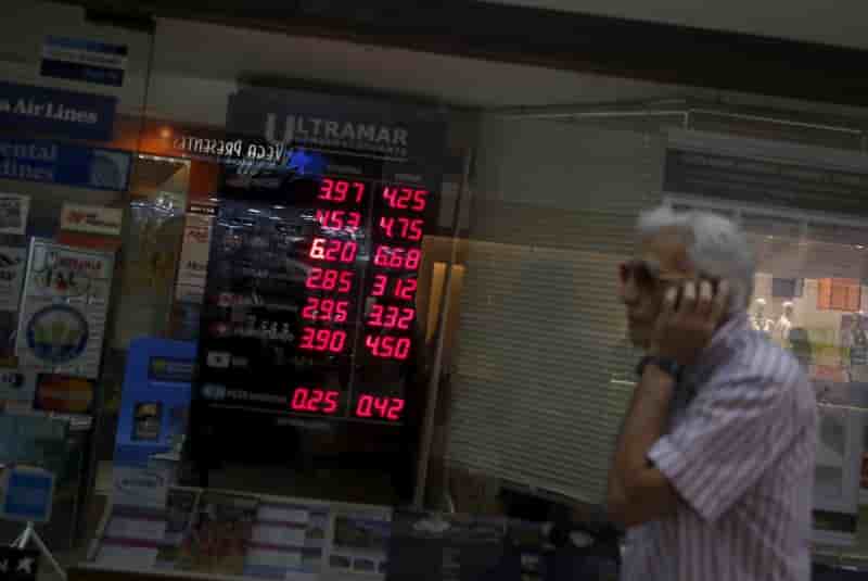 Le real bresilien tombe a un plus bas historique face au dollar