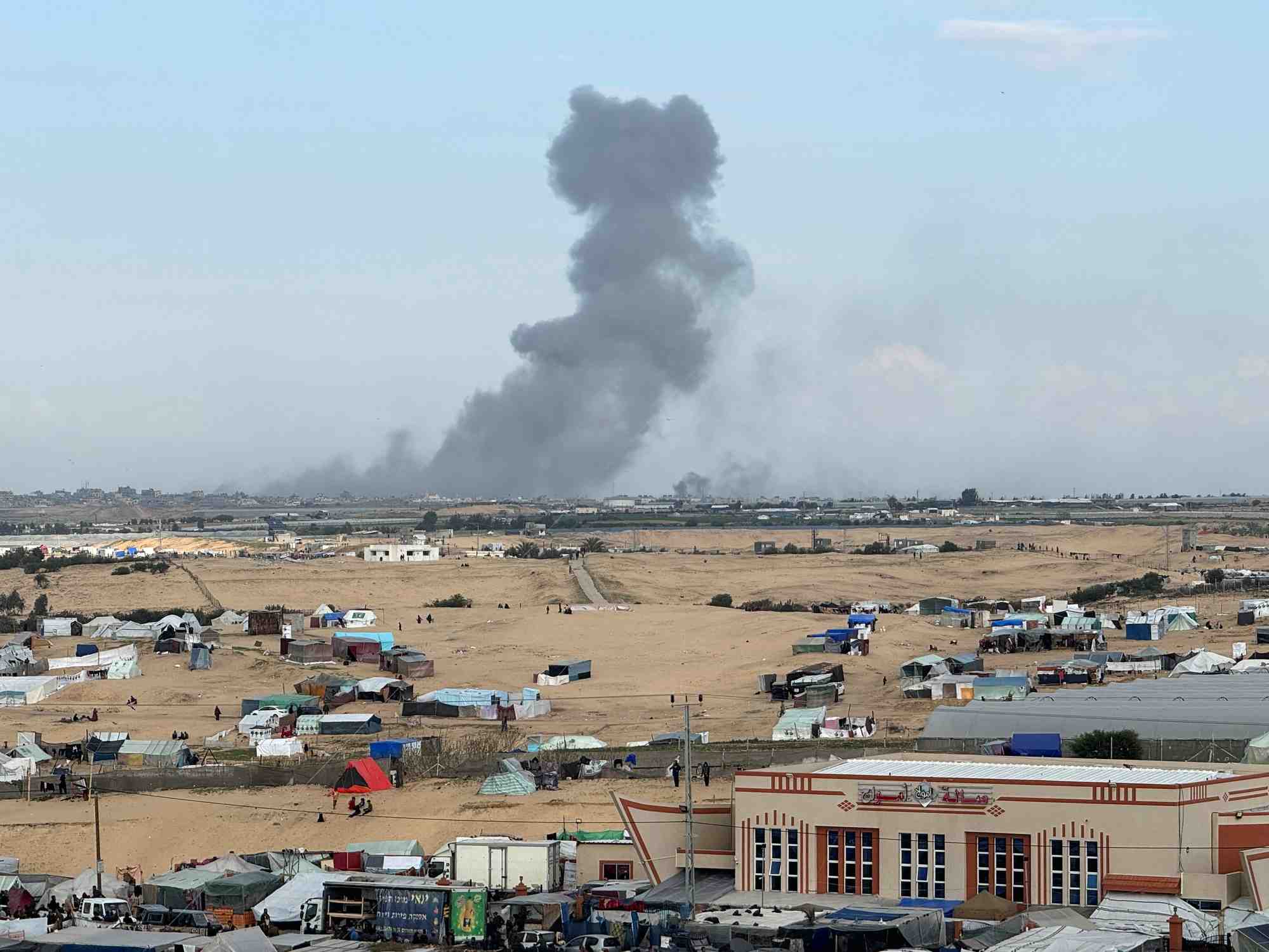 Smoke rises during an israeli ground operation in khan younis