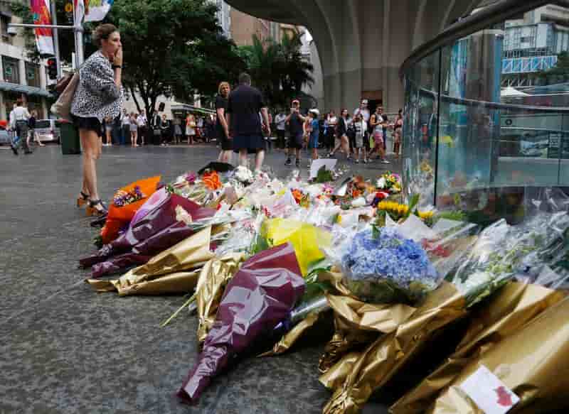 Recueillement et interrogations à Sydney après la prise d'otages
