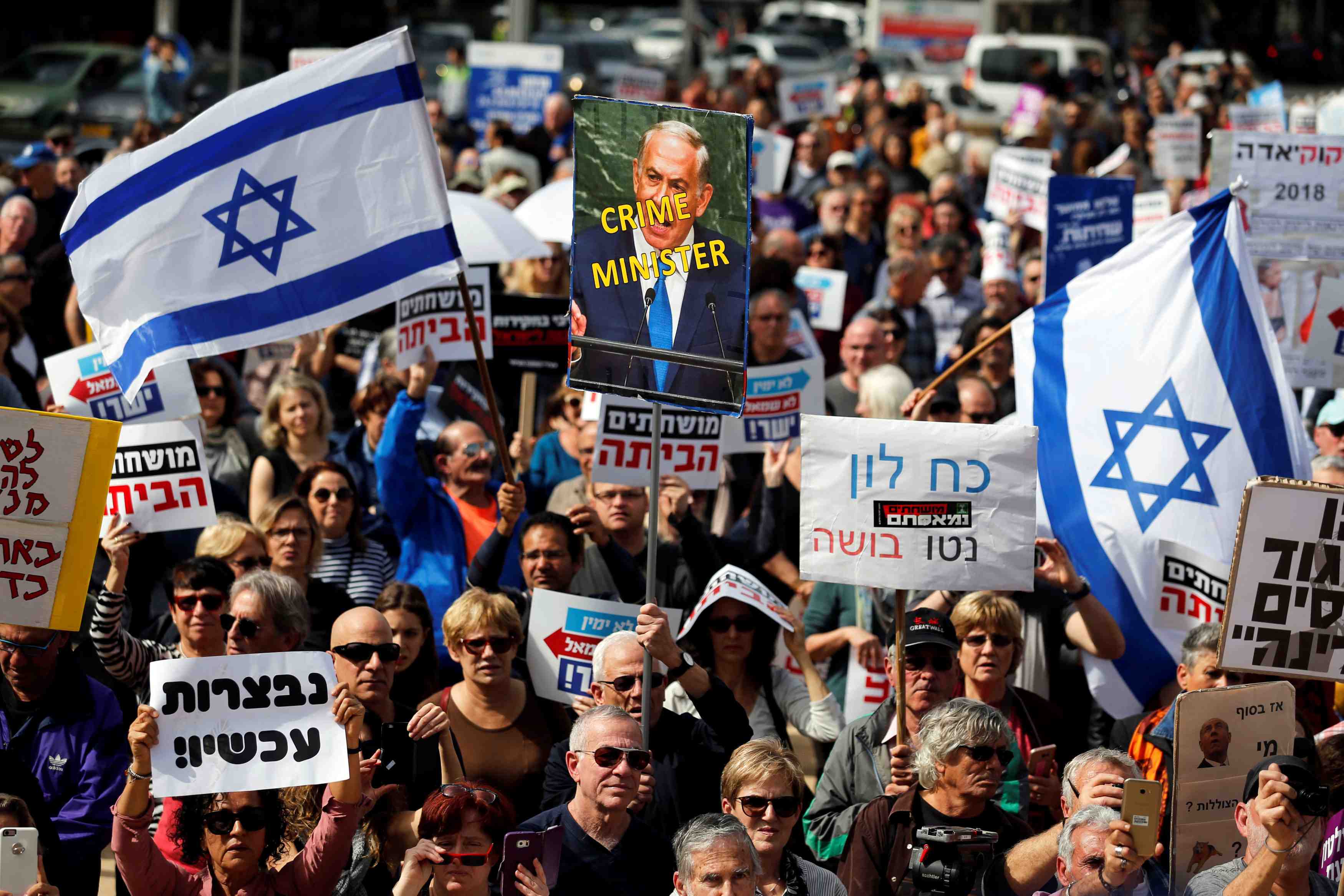 Des manifestants israeliens demandent la demission de netanyahu