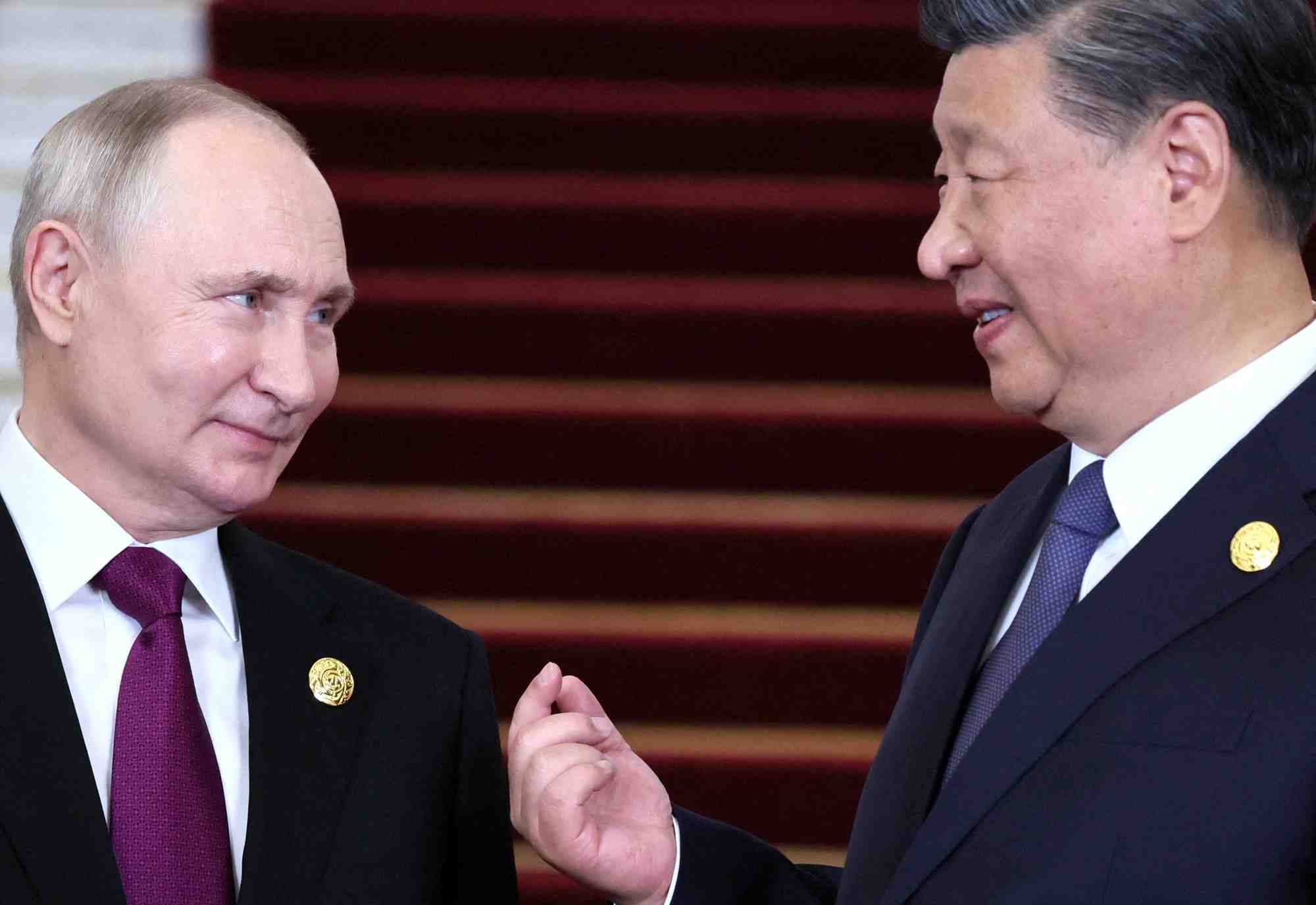 Photo d'archives: le president russe vladimir poutine s'entretient avec le president chinois xi jinping