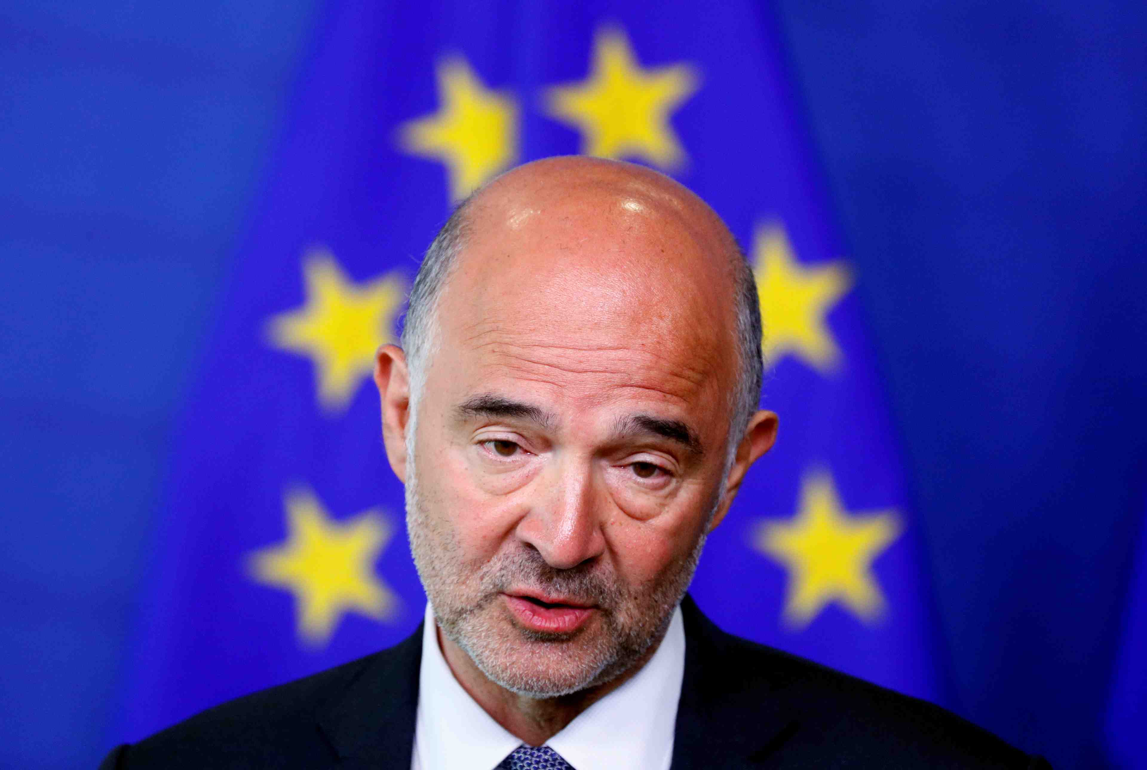 L'italie doit continuer a reduire sa dette, dit moscovici