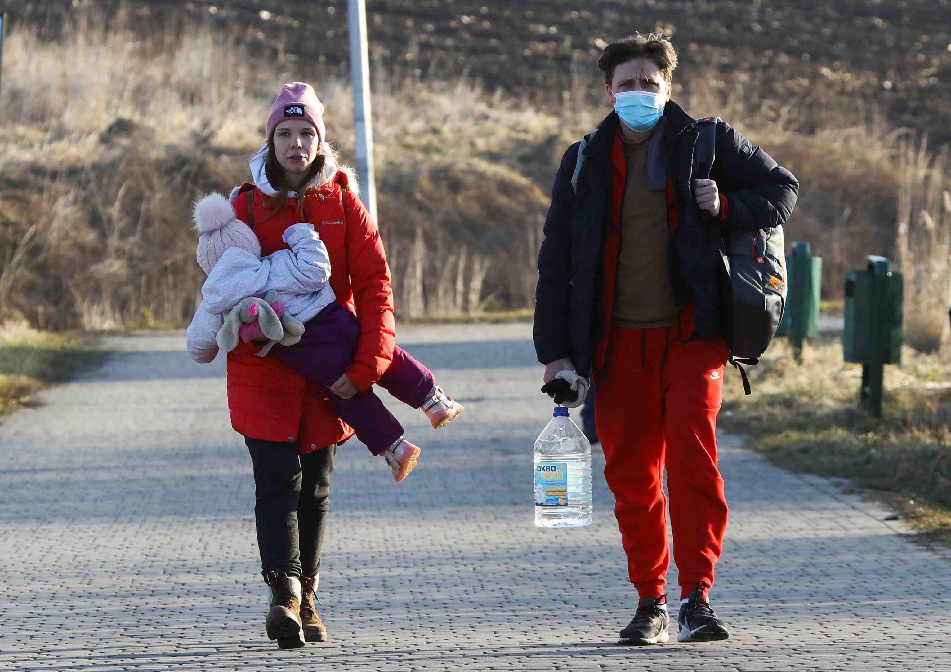 People cross the border between poland and ukraine