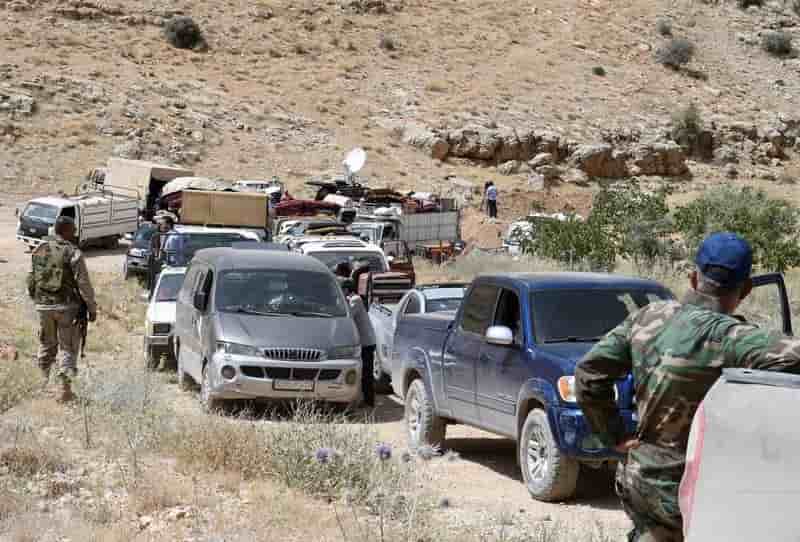 Un nouveau convoi de refugies quitte le liban pour la syrie
