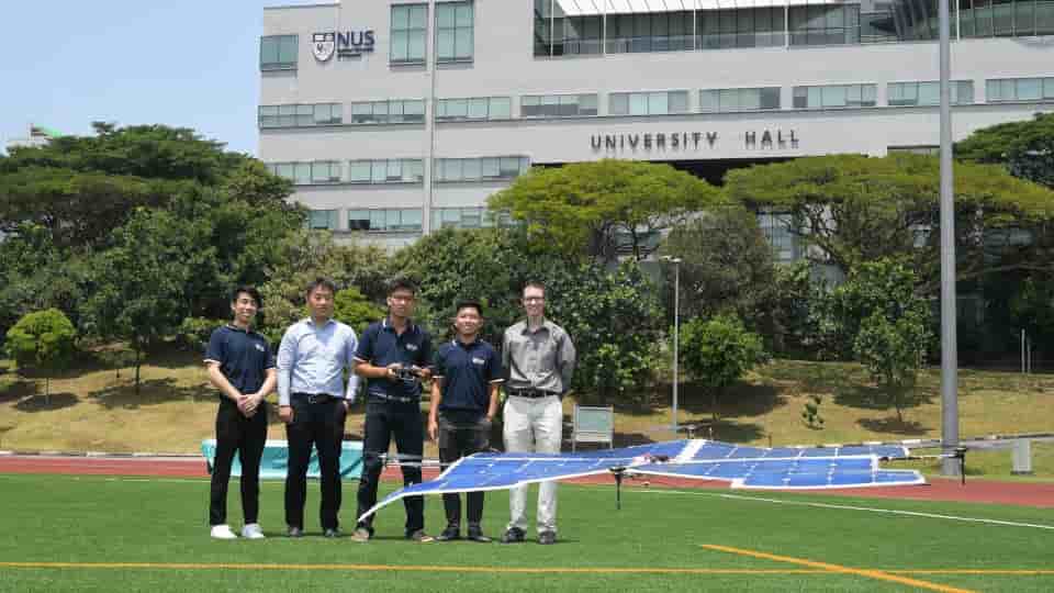 Students with solar-powered drone.