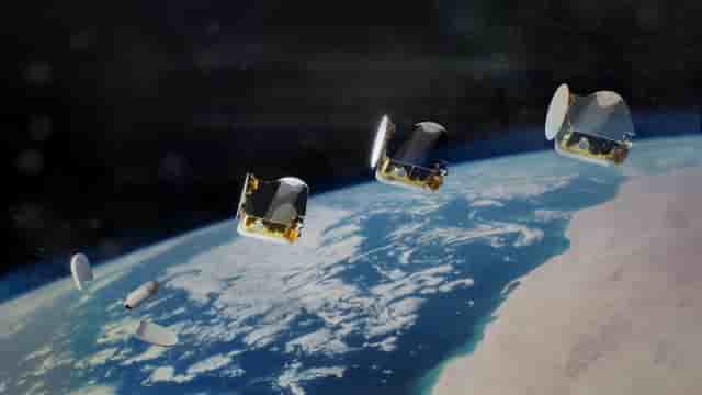 Vue d'artiste du déploiement sur orbite d'un trio de satellites OneSat d'Airbus