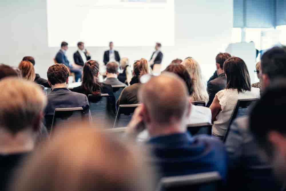 Interview and round table discussion at business convention and presentation. Audience at the conference hall. Business and entrepreneurship symposium. - Interview and round table discussion at business convention and presentation. Audience at the...