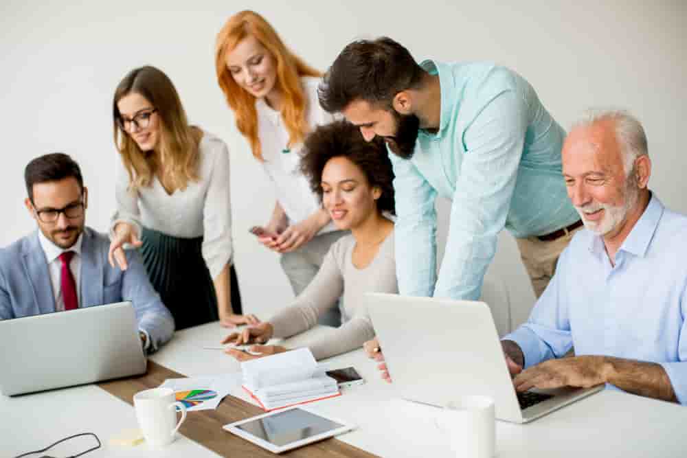 Multiracial business people working on project in office - Multiracial business people working in office