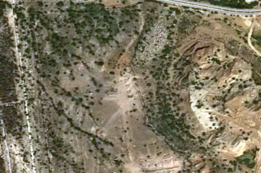 Image satellite montrant les dégâts sur l'île de Kharg, en Iran, après les frappes américaines, le 14 mars 2026.