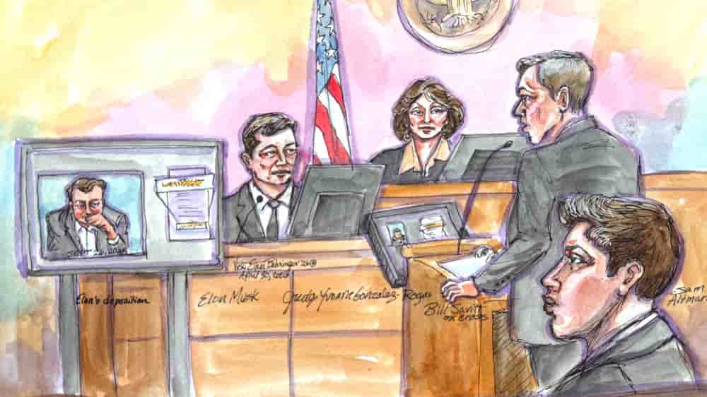 L'avocat d'OpenAI, William Savitt, contre-interroge Elon Musk tandis que la vidéo de sa déposition est diffusée sur un écran, lors du procès intenté par Musk concernant la transformation d'OpenAI en société à but lucratif devant la juge fédérale Yvonne...