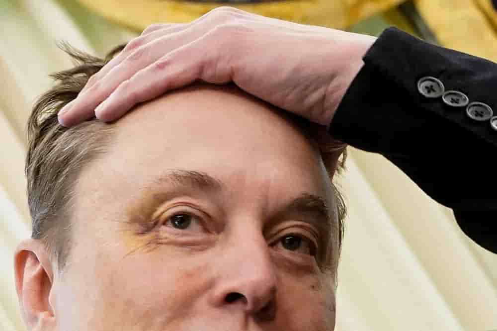 Elon Musk shows a bruised eye that Musk claimed he received at the hands of his son, X Æ A-12, as he attends a press conference with U.S. President Donald Trump in the Oval Office at the White House in Washington, D.C., U.S., May 30, 2025....