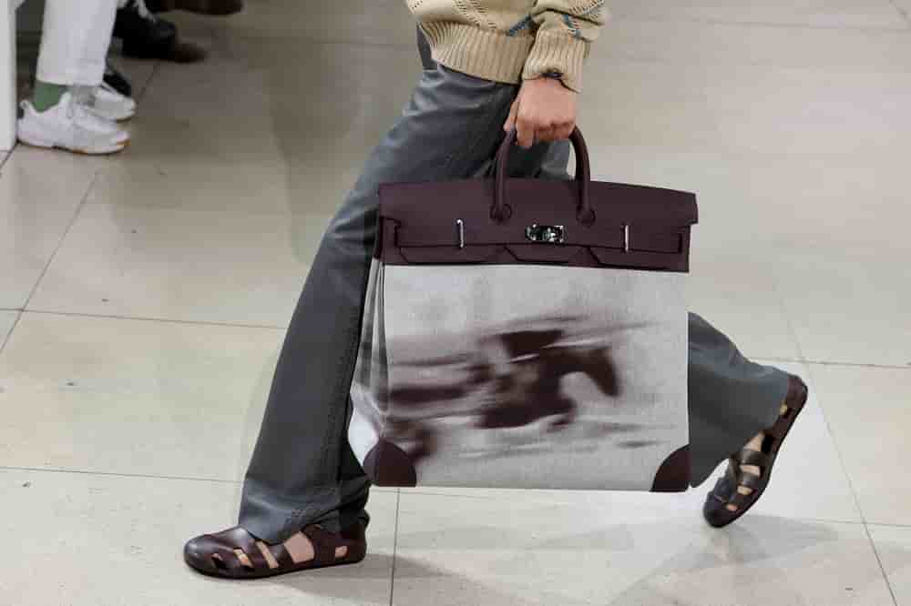 FILE PHOTO: A model presents a creation by designer Veronique Nichanian as part of her Menswear Spring/Summer 2026 collection show for the fashion house Hermes during Men's Fashion Week in Paris, France, June 28, 2025. REUTERS/Gonzalo Fuentes/File...