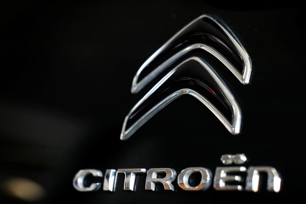 A logo of Citroen is seen inside a car dealer in Nijmegen, Netherlands February 26, 2025. REUTERS/Piroschka van de Wouw - A logo of Citroen is seen inside a car dealer in Nijmegen - GLOBAL-COMPANY/CITROEN