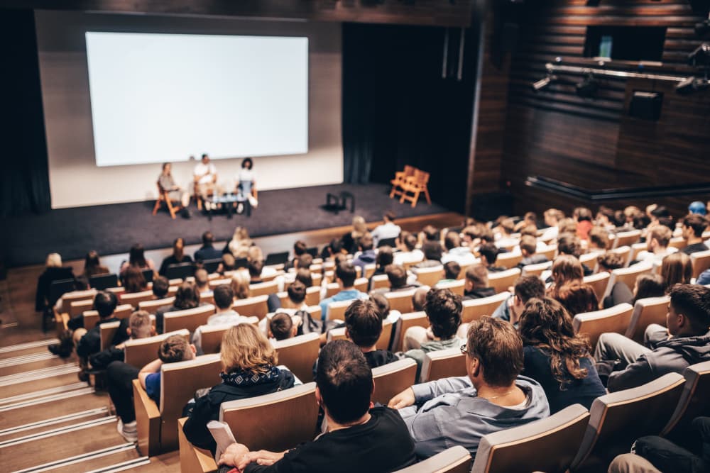 Interview and round table discussion at business convention and presentation. Audience at the conference hall. Business and entrepreneurship symposium. - Interview and round table discussion at business convention and presentation. Audience at the...