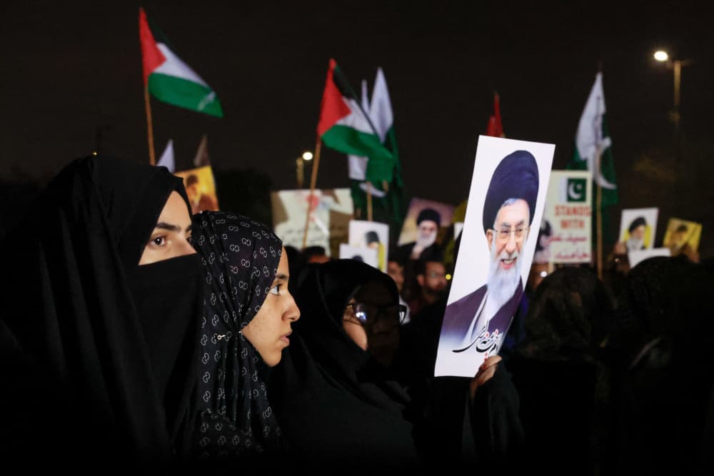 Shiite Muslim supporter of the Imamia Student Organization (ISO) holds a portrait of Iran's Supreme Leader Ayatollah Ali Khamenei during a protest against Israel and the U.S. strikes on Iran, in Karachi, Pakistan February 28, 2026. REUTERS/Akhtar...