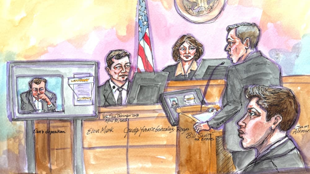 L'avocat d'OpenAI, William Savitt, contre-interroge Elon Musk tandis que la vidéo de sa déposition est diffusée sur un écran, lors du procès intenté par Musk concernant la transformation d'OpenAI en société à but lucratif devant la juge fédérale Yvonne...